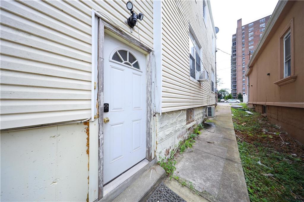 2667 Cropsey Avenue Brooklyn, NY 11214 - Photo 7 of 40 a backyard of a house with lots of green space