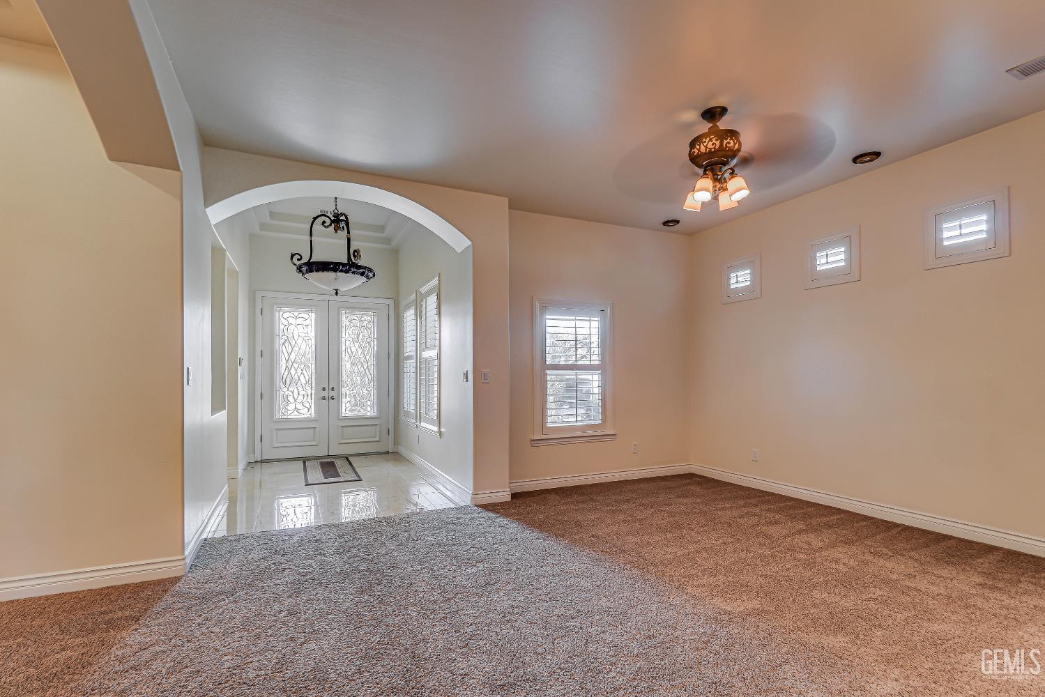 Undisclosed Address Bakersfield, CA 93311 - Photo 14 of 41 wooden floor in an empty room with a window