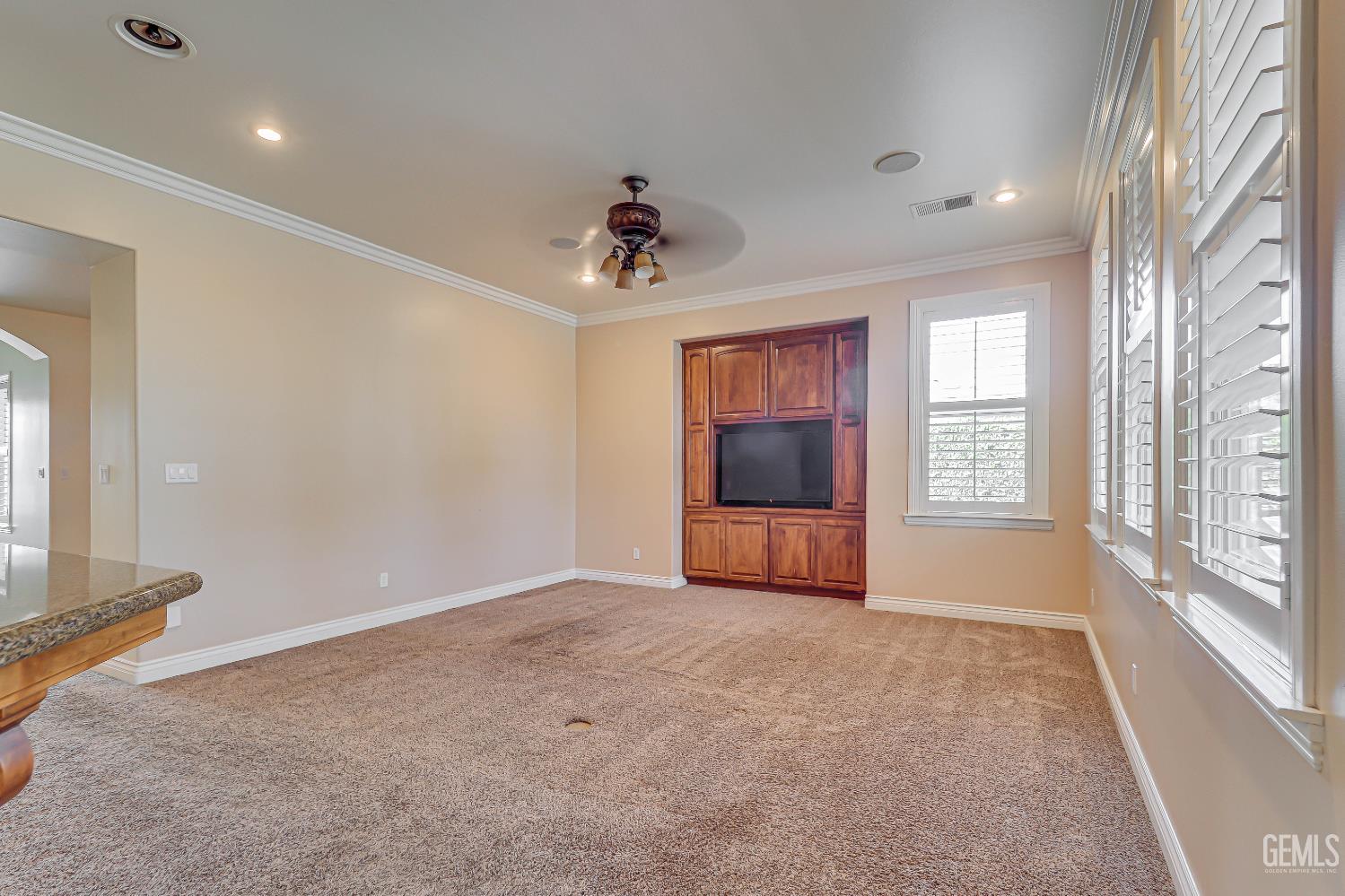Undisclosed Address Bakersfield, CA 93311 - Photo 19 of 41 a view of an empty room with a window