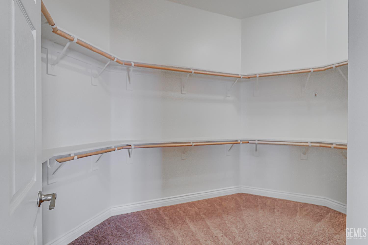 Undisclosed Address Bakersfield, CA 93311 - Photo 26 of 41 a view of an empty walk in closet