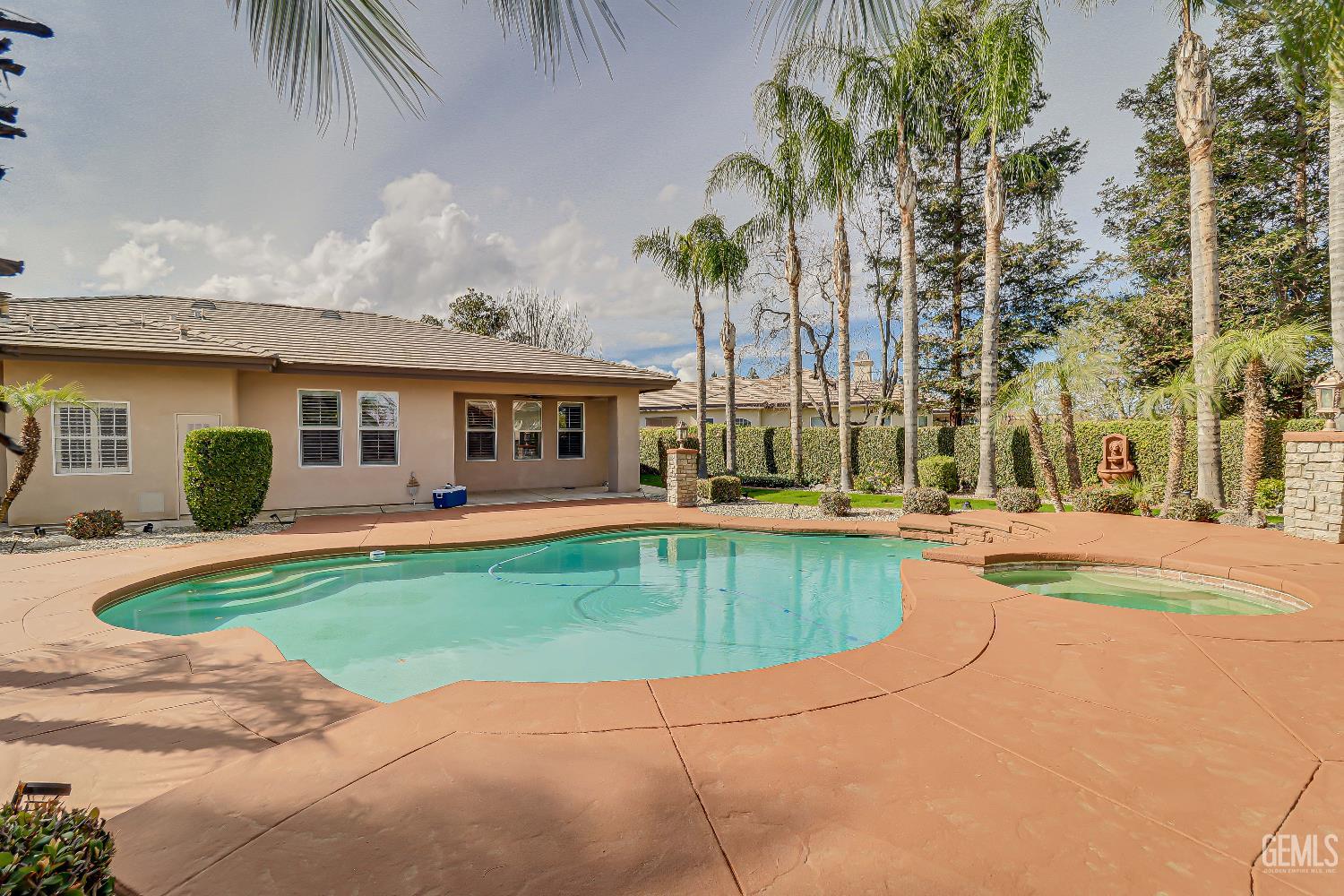 Undisclosed Address Bakersfield, CA 93311 - Photo 39 of 41 a front view of a house with swimming pool having outdoor seating