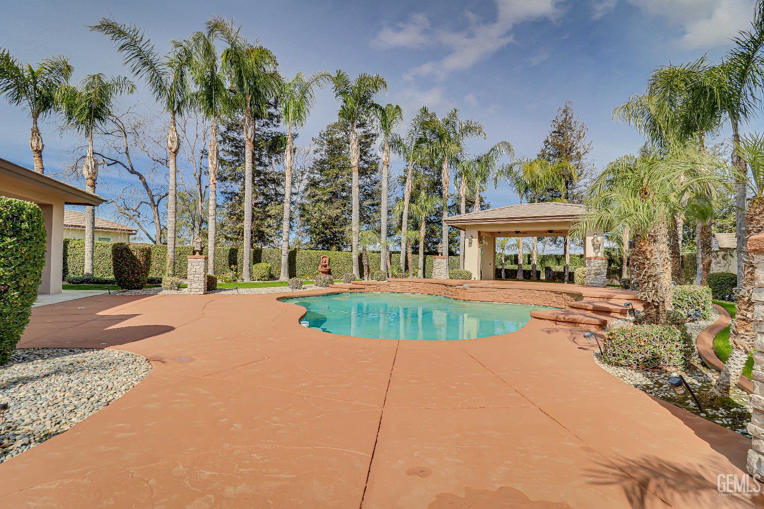 Undisclosed Address Bakersfield, CA 93311 - Photo 40 of 41 front view of a house with a yard and potted plants