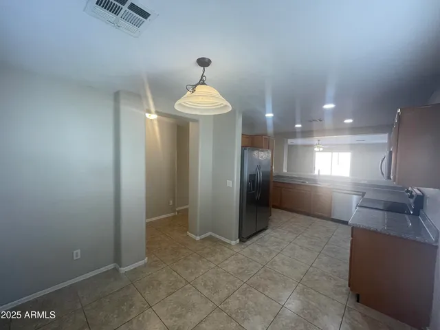 a bathroom with a sink a shower and a mirror