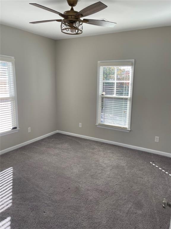3544 College Street Atlanta, GA 30337 - Photo 14 of 17 an empty room with a window and a fan