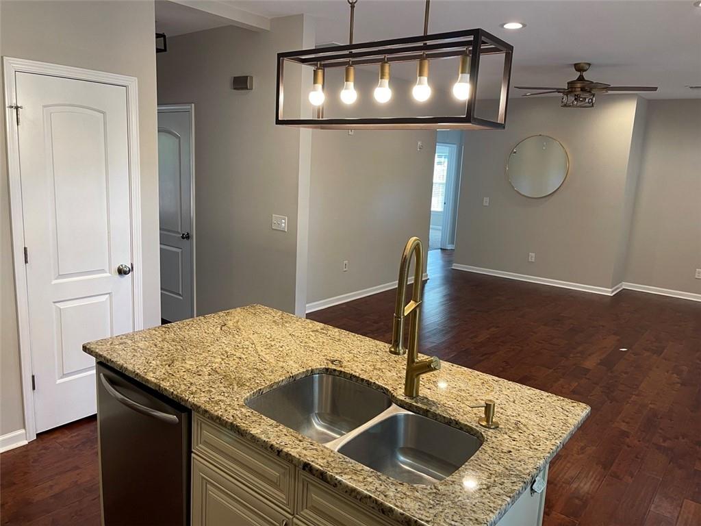 3544 College Street Atlanta, GA 30337 - Photo 2 of 17 a kitchen with a sink a counter space and cabinets