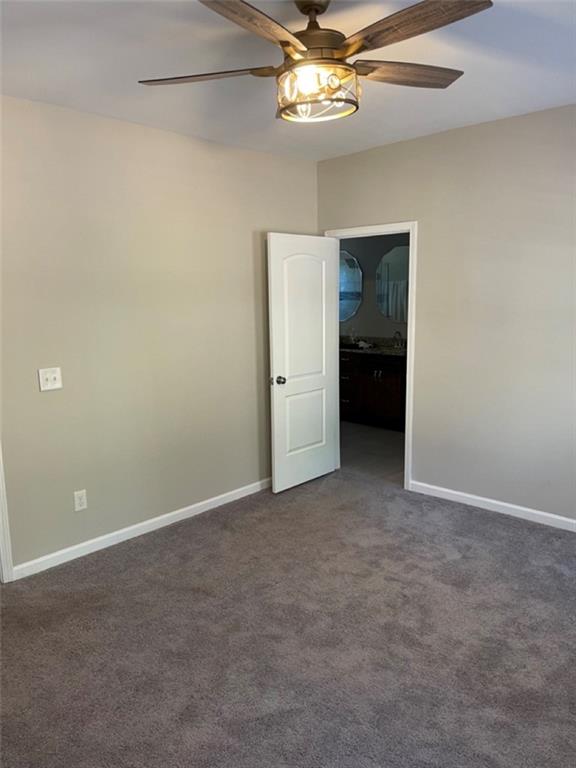 3544 College Street Atlanta, GA 30337 - Photo 4 of 17 an empty room with a view of a livingroom