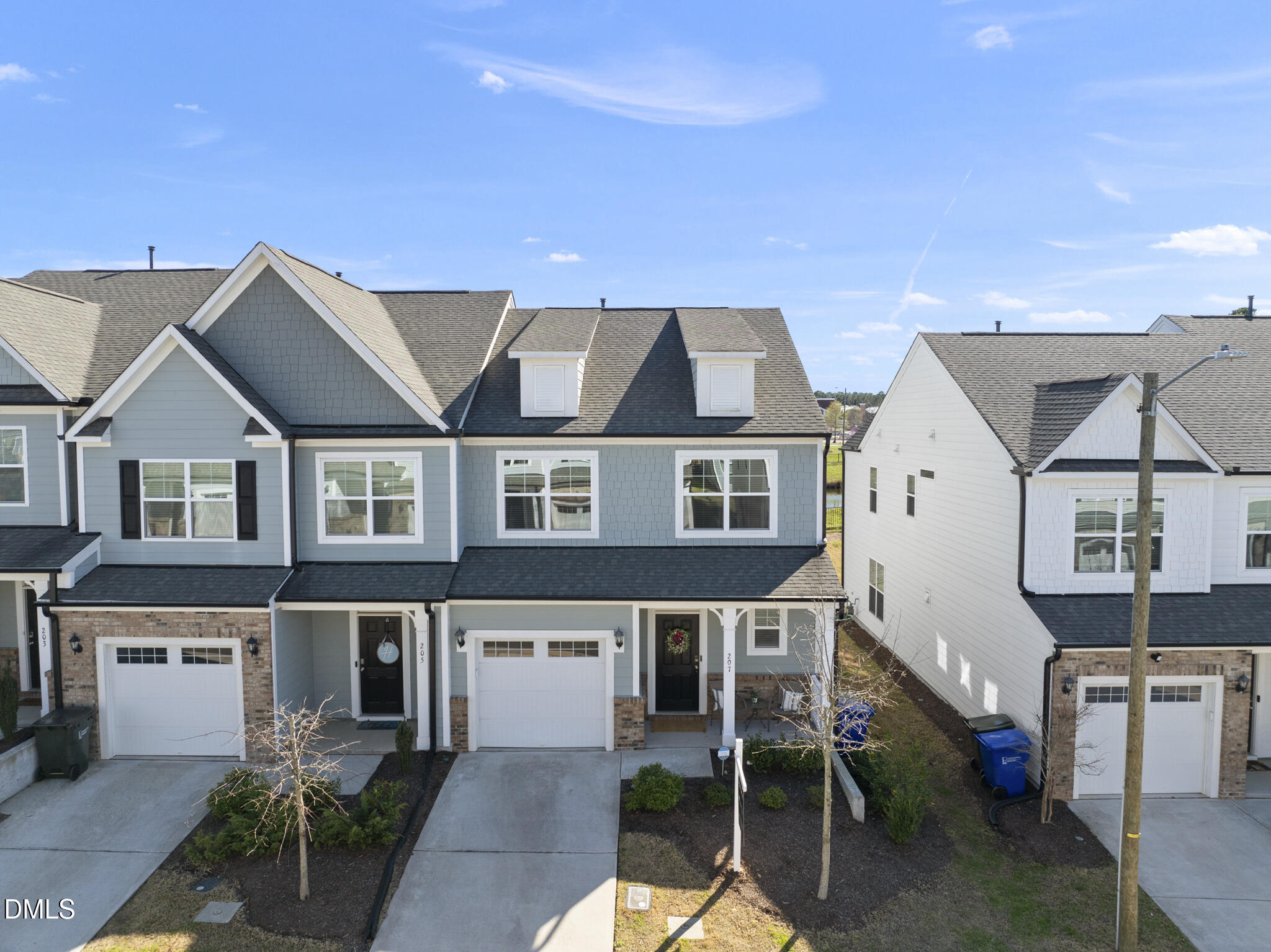 207 Marbella Grove Durham, NC 27713 - Photo 1 of 48 a aerial view of a brick house with a yard