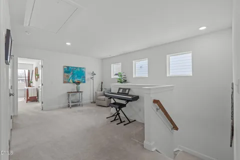 a view of livingroom with furniture and a chandelier