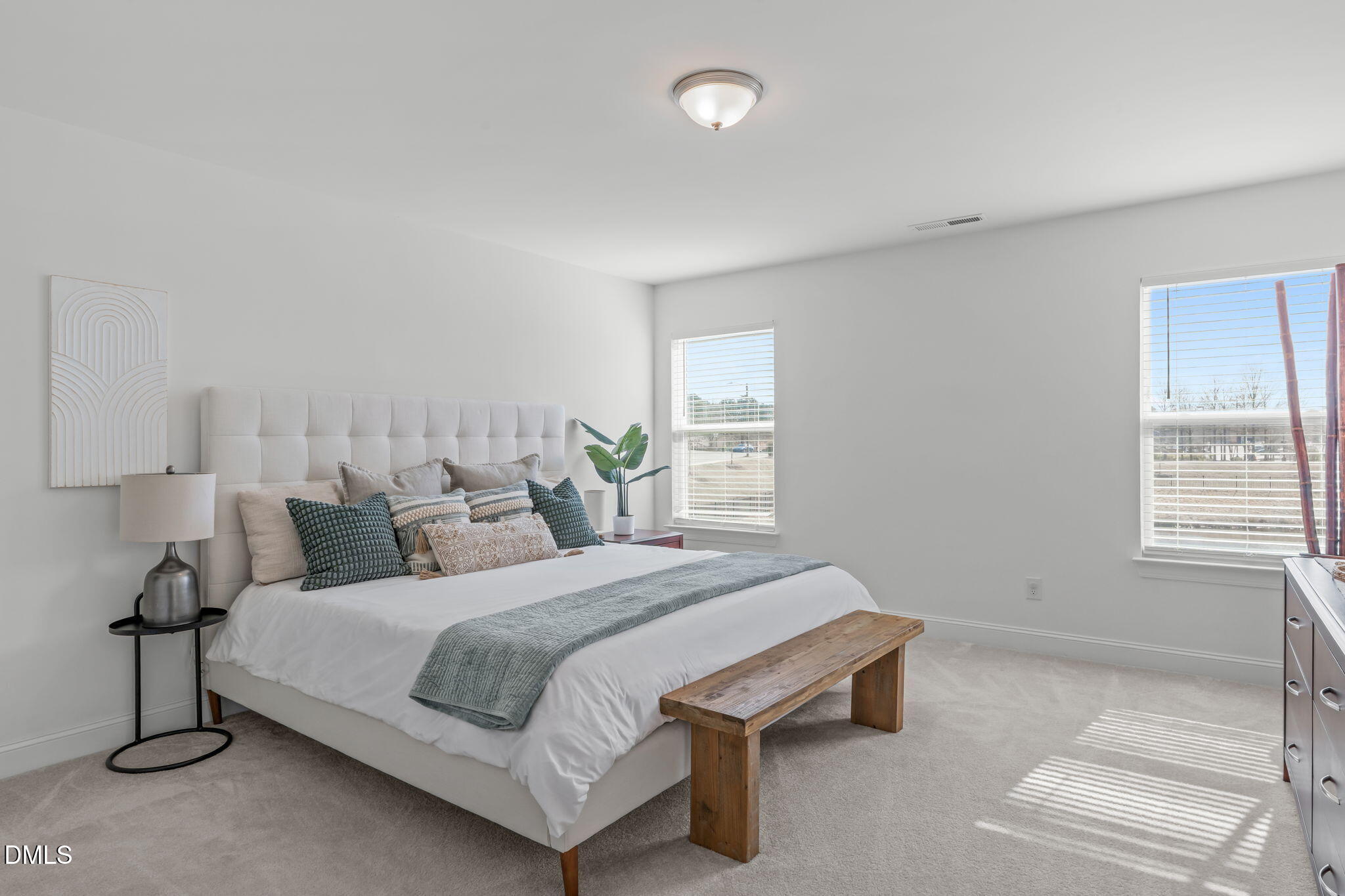 207 Marbella Grove Durham, NC 27713 - Photo 28 of 48 a bedroom with a bed and a window