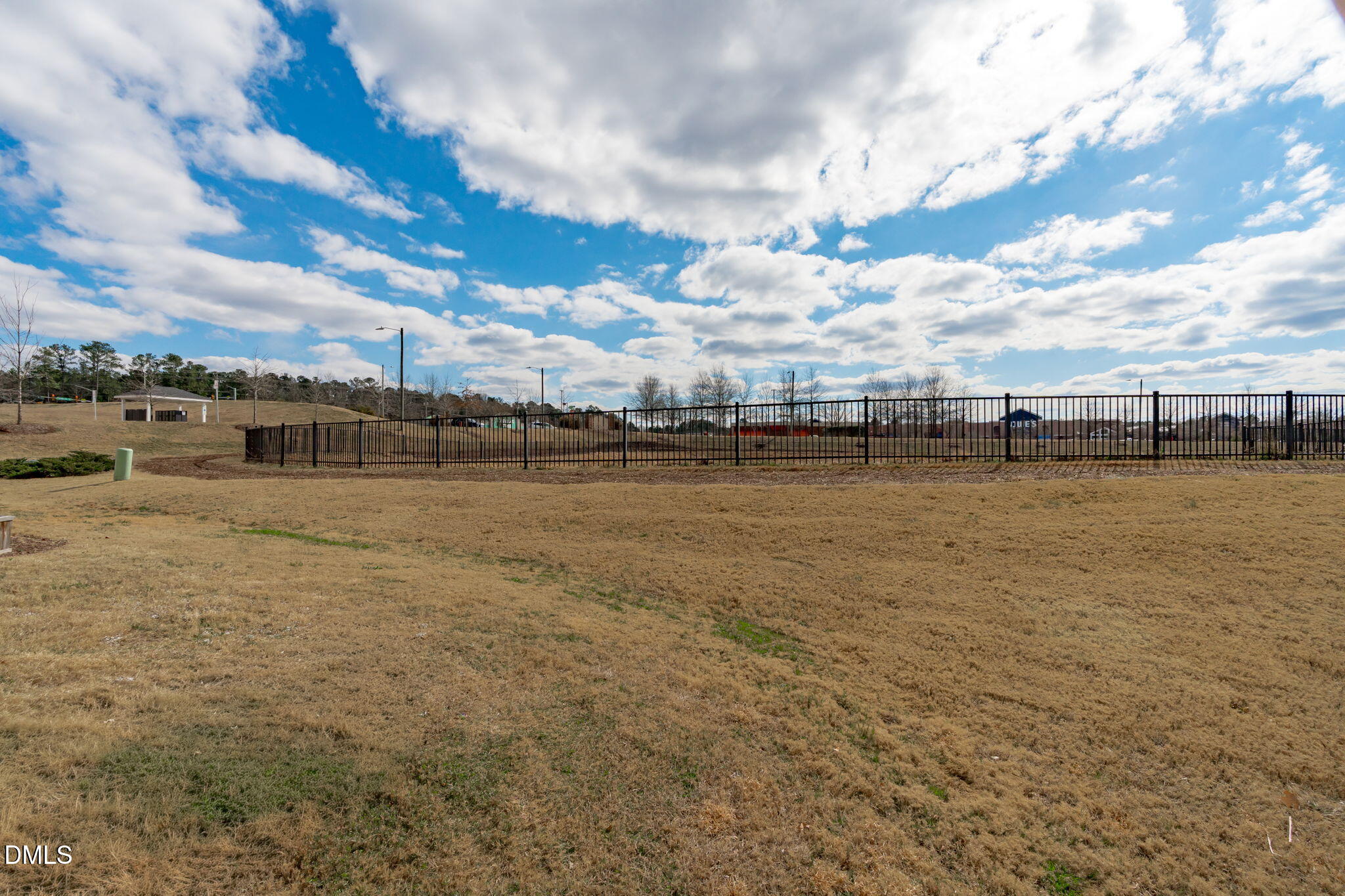207 Marbella Grove Durham, NC 27713 - Photo 35 of 48 a view of a ocean with boats and trees in the background