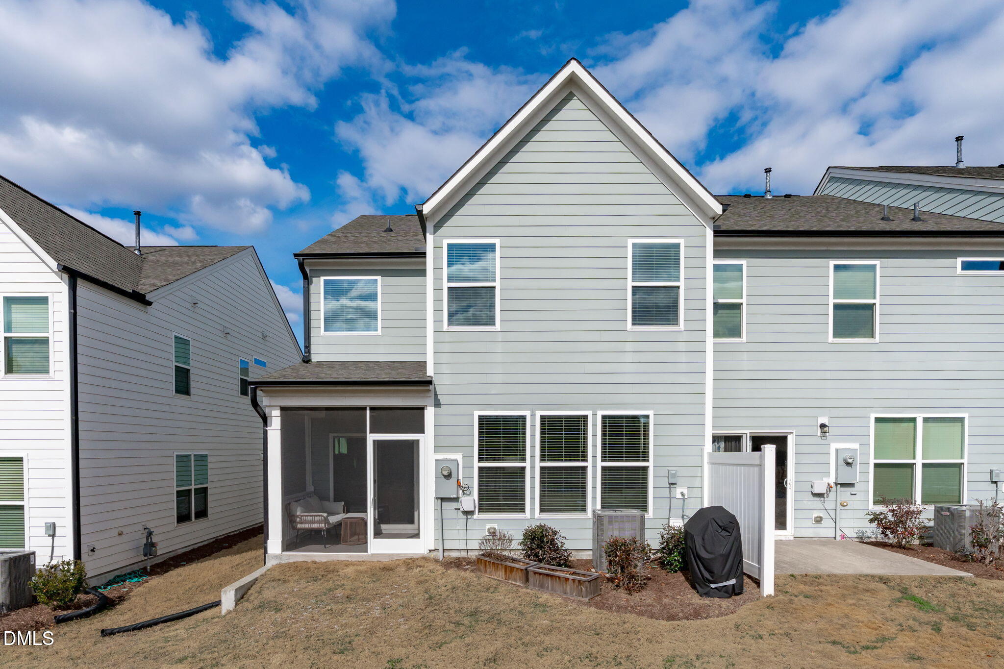 207 Marbella Grove Durham, NC 27713 - Photo 37 of 48 a view of a house with a patio