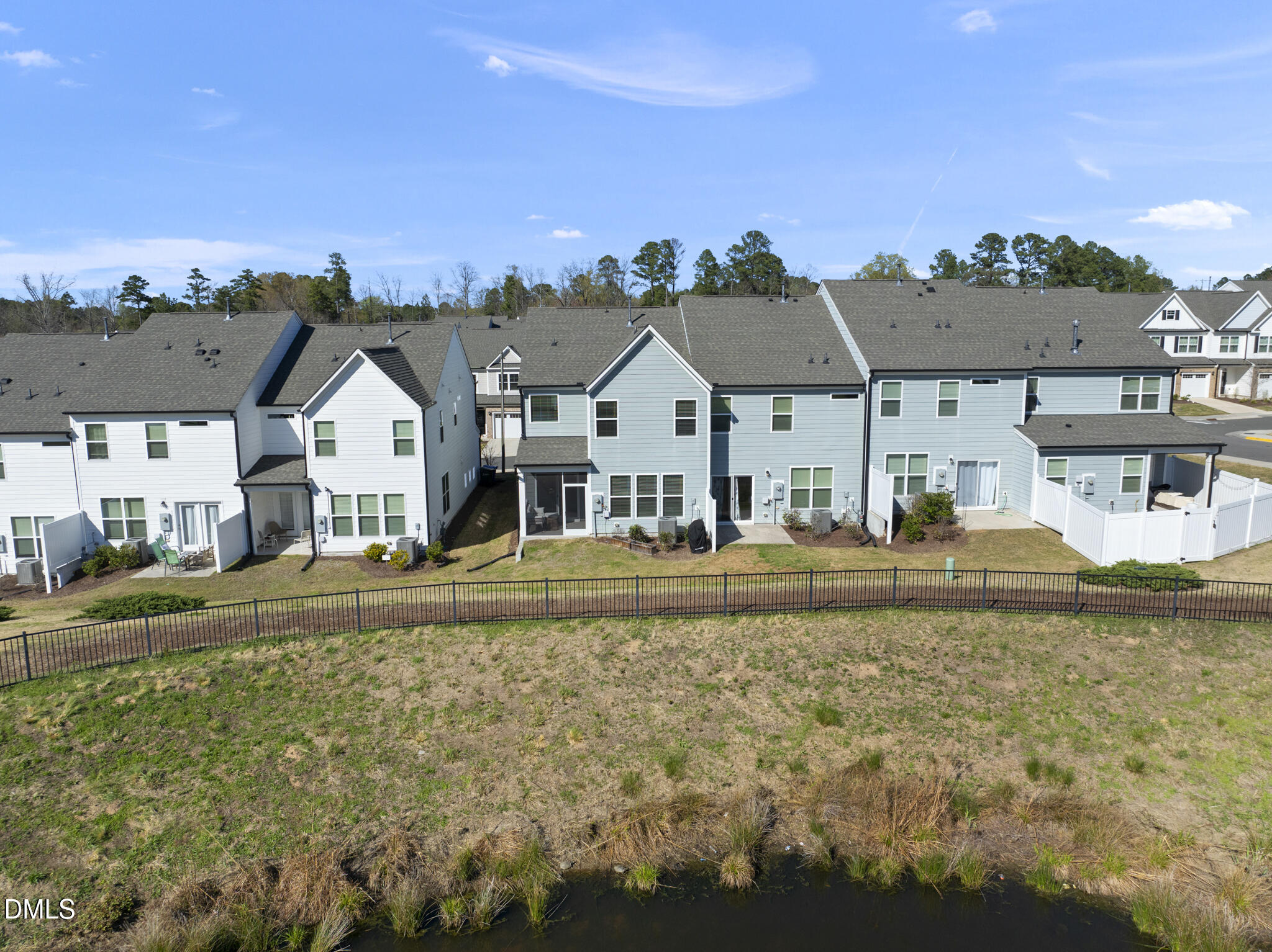 207 Marbella Grove Durham, NC 27713 - Photo 38 of 48 a view of house with outdoor space and swimming pool