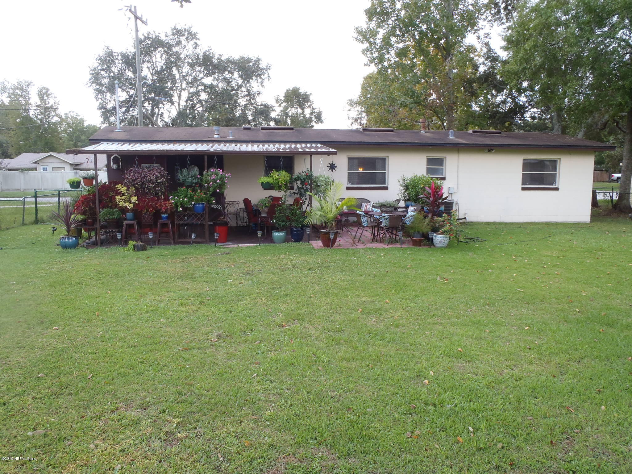 5535 Beney Road Jacksonville, FL 32207 - Photo 4 of 25 a view of a house with backyard and sitting area