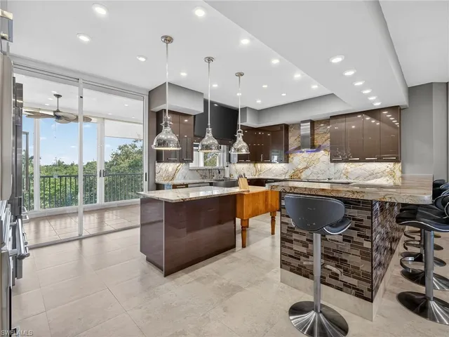 a kitchen with a table and chairs in it