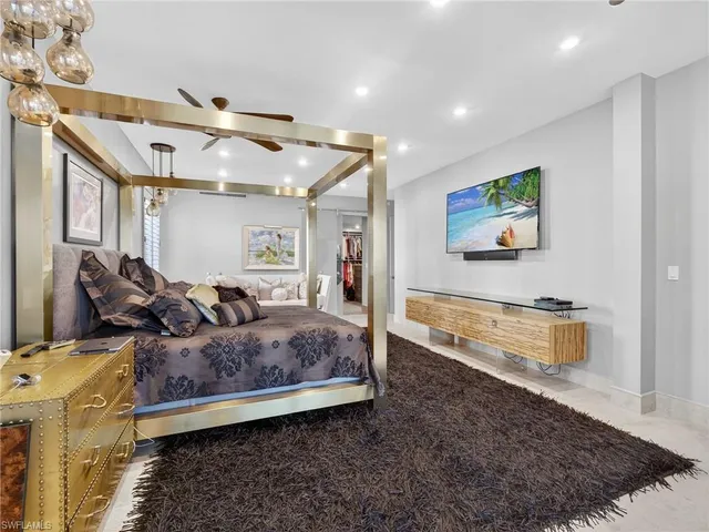 a kitchen with a sink and large window