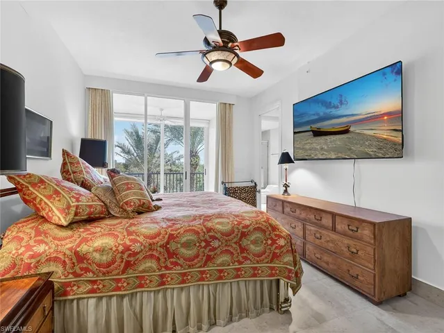 a bathroom with a double vanity sink toilet and shower