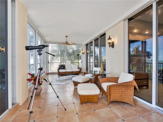 a view of a storage and utility room with two washing machine