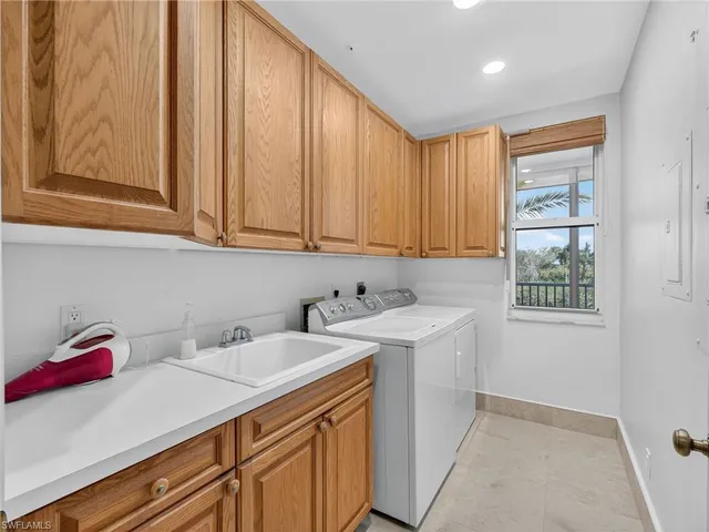 a view of a dinning tables and chairs in the patio of a house