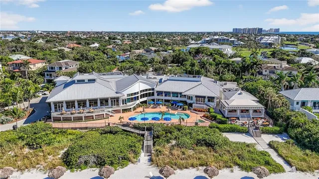 a view of a swimming pool with a garden