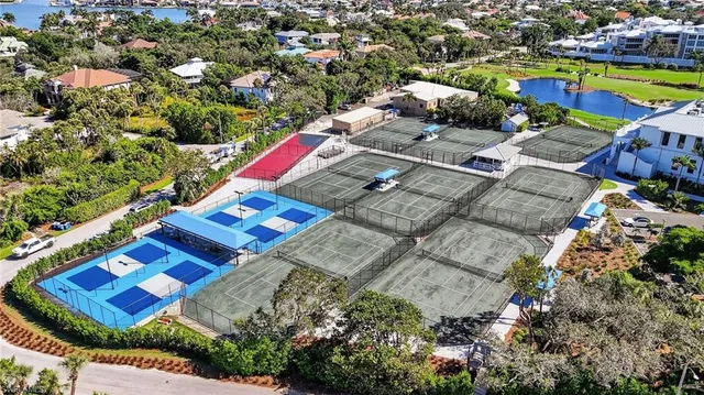 an aerial view of a pool yard residential house and outdoor space