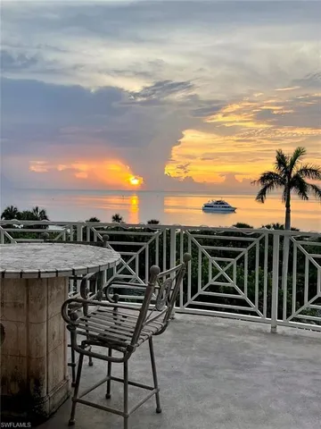a view of a terrace with chairs
