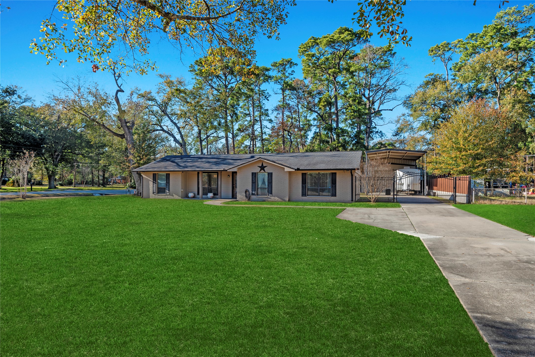 1203 Lemm Road 2 Spring, TX 77373 - Photo 2 of 21 This traditional brick ranch sits back on a large lot with a gated driveway for added privacy providing a stately presence and a rare sense of space so close to the city.