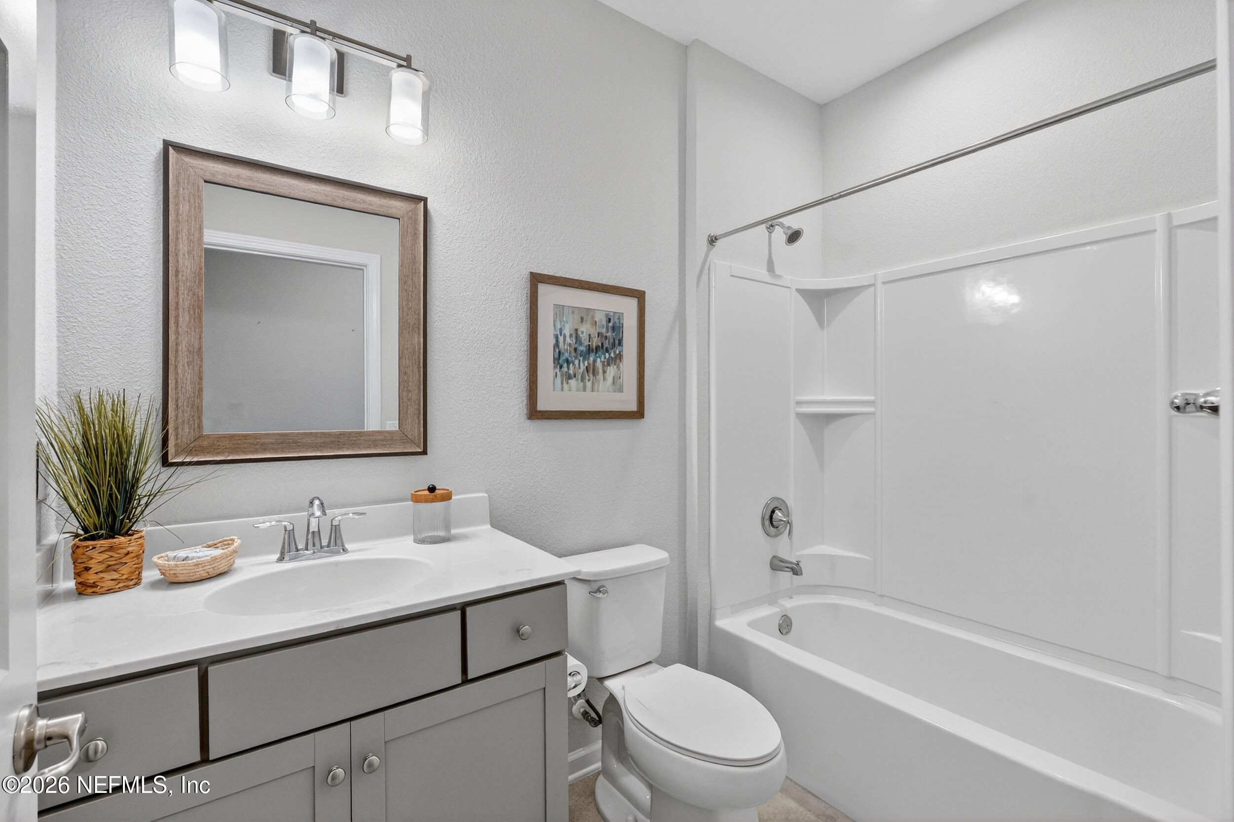 103 Ferndale Way St. Augustine, FL 32092 - Photo 15 of 54 a bathroom with a sink toilet a vanity and shower