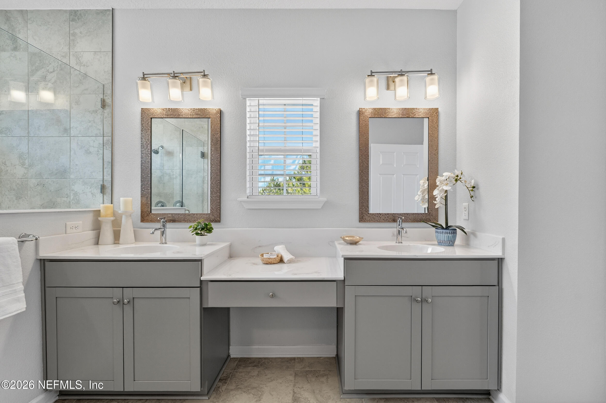 103 Ferndale Way St. Augustine, FL 32092 - Photo 25 of 54 a bathroom with a double vanity sink mirror and