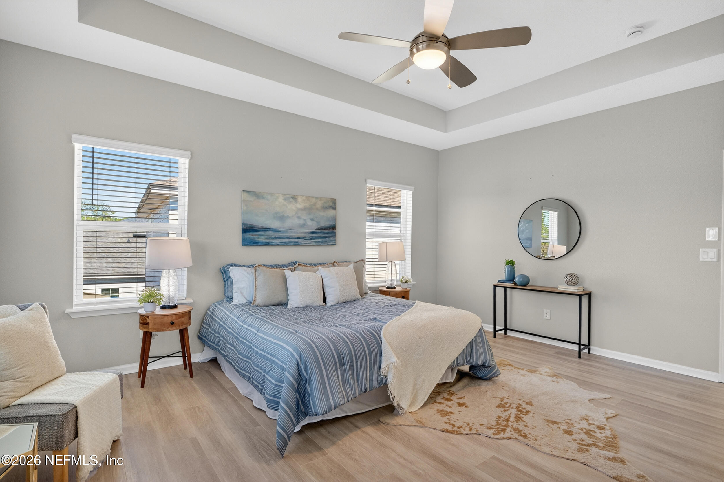 103 Ferndale Way St. Augustine, FL 32092 - Photo 26 of 54 a bedroom with a bed a chandelier and a window