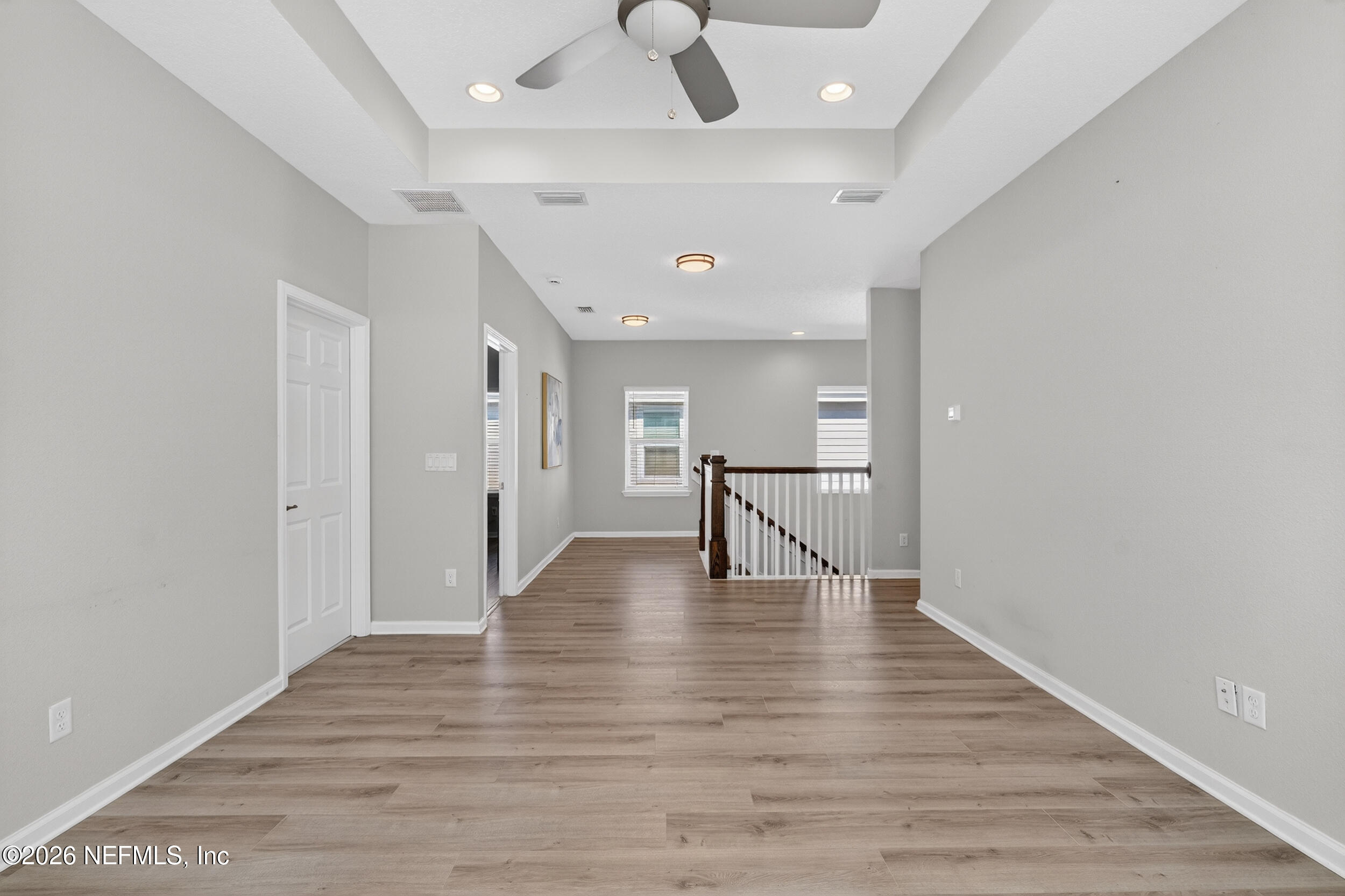 103 Ferndale Way St. Augustine, FL 32092 - Photo 27 of 54 a view of an empty room with wooden floor
