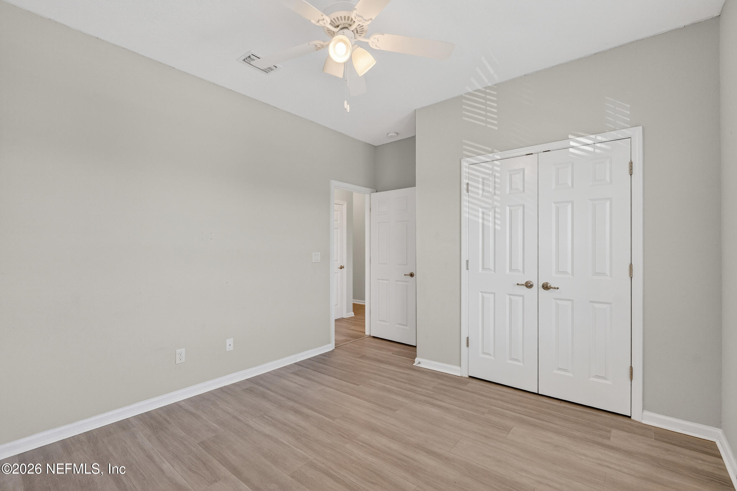 103 Ferndale Way St. Augustine, FL 32092 - Photo 30 of 54 a view of an empty room with wooden floor