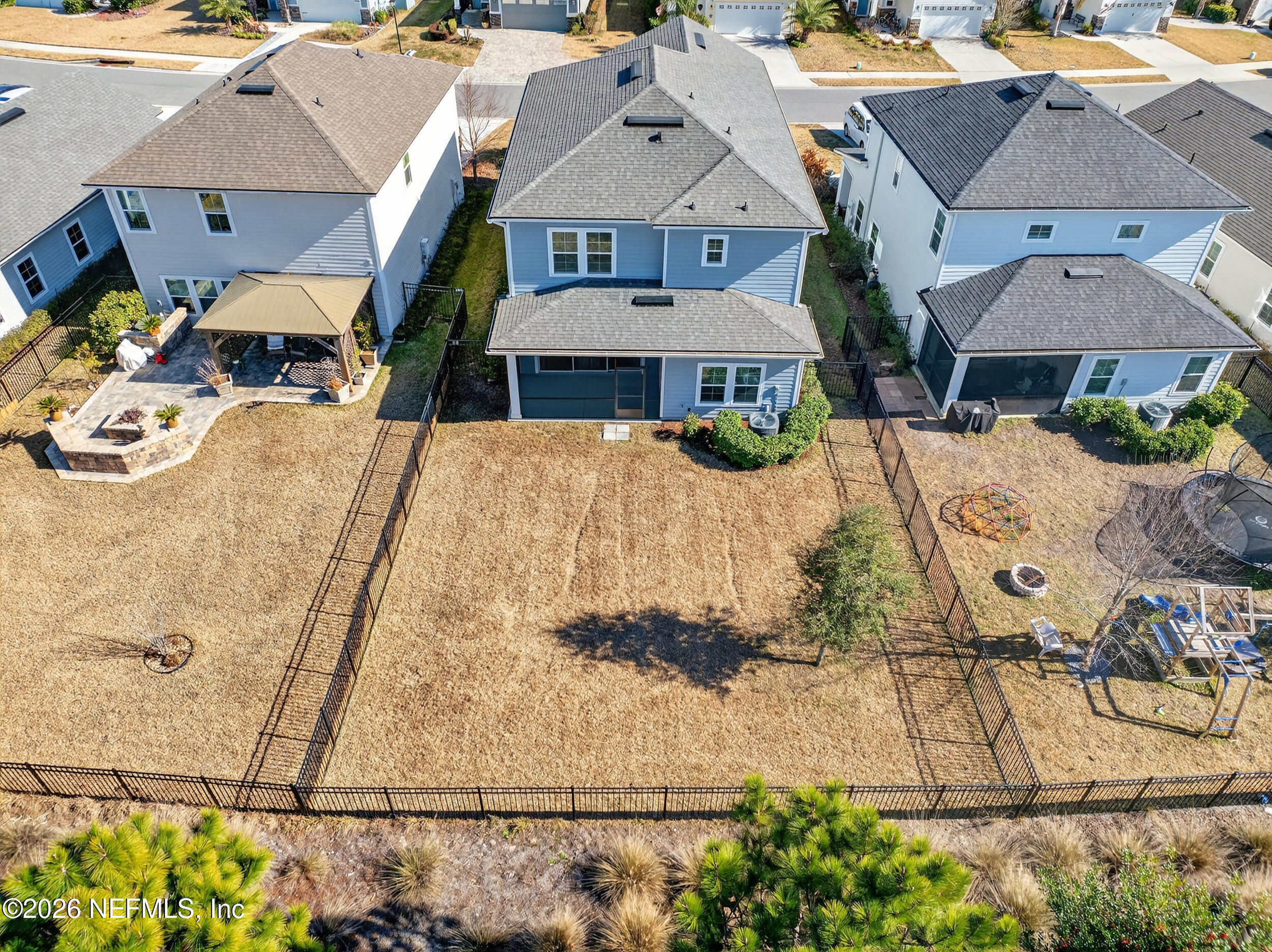 103 Ferndale Way St. Augustine, FL 32092 - Photo 39 of 54 an aerial view of a house with a swimming pool