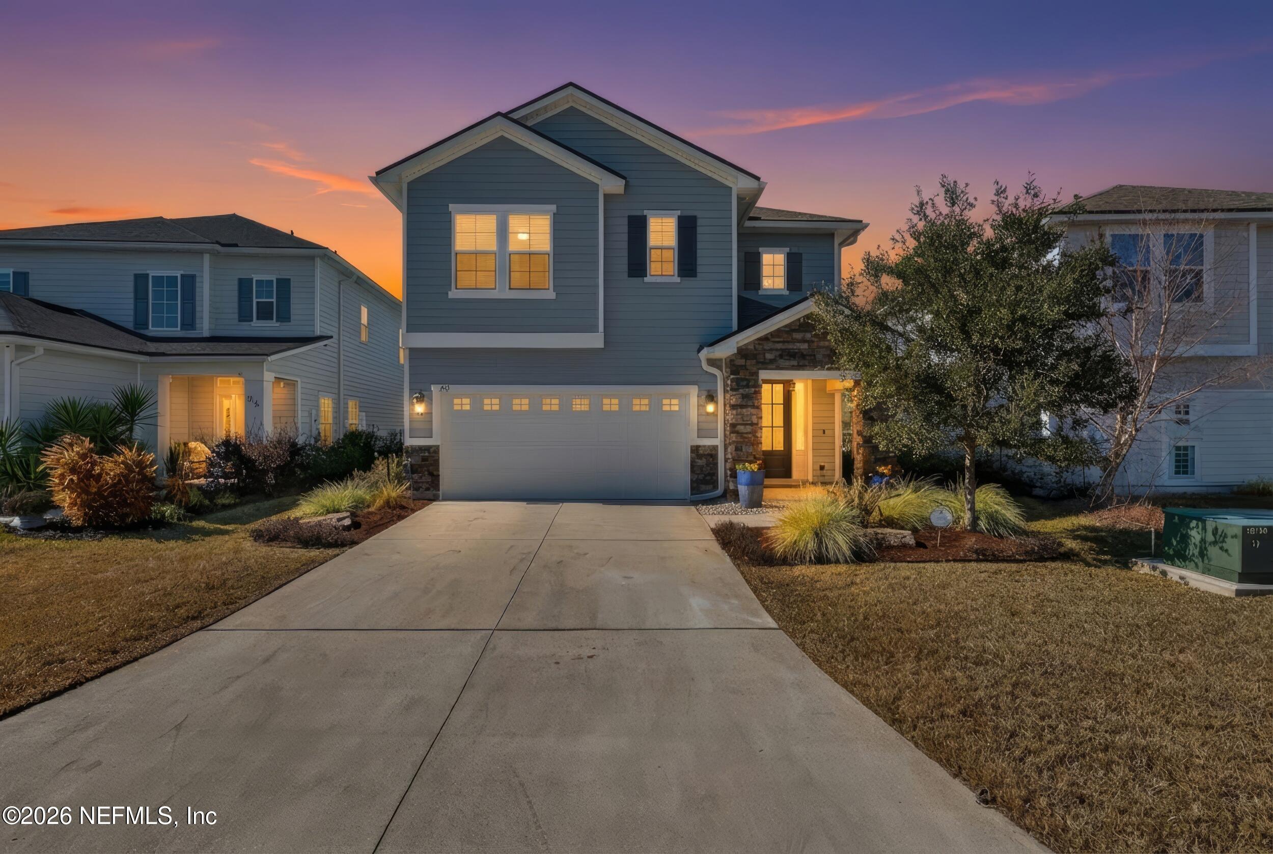 103 Ferndale Way St. Augustine, FL 32092 - Photo 43 of 54 a front view of a house with a yard