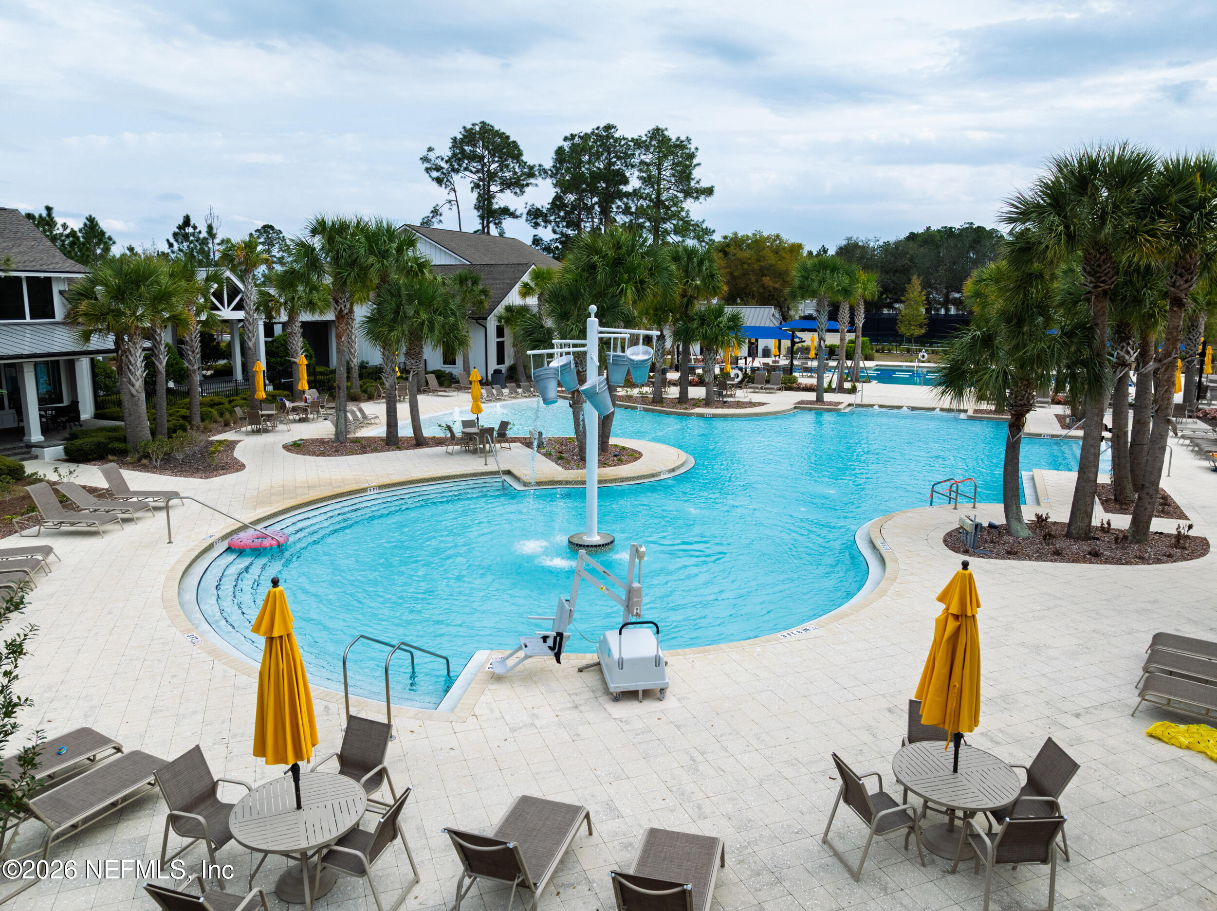 103 Ferndale Way St. Augustine, FL 32092 - Photo 47 of 54 a view of a swimming pool with lounge chairs