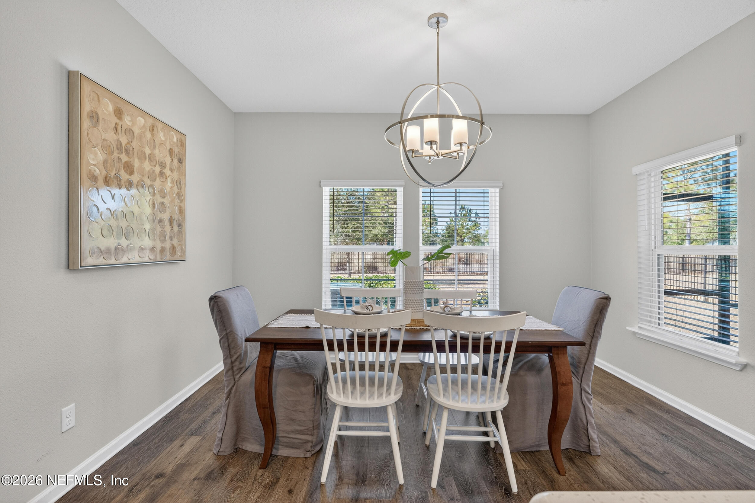 103 Ferndale Way St. Augustine, FL 32092 - Photo 9 of 54 a view of a dining room with furniture window and wooden floor