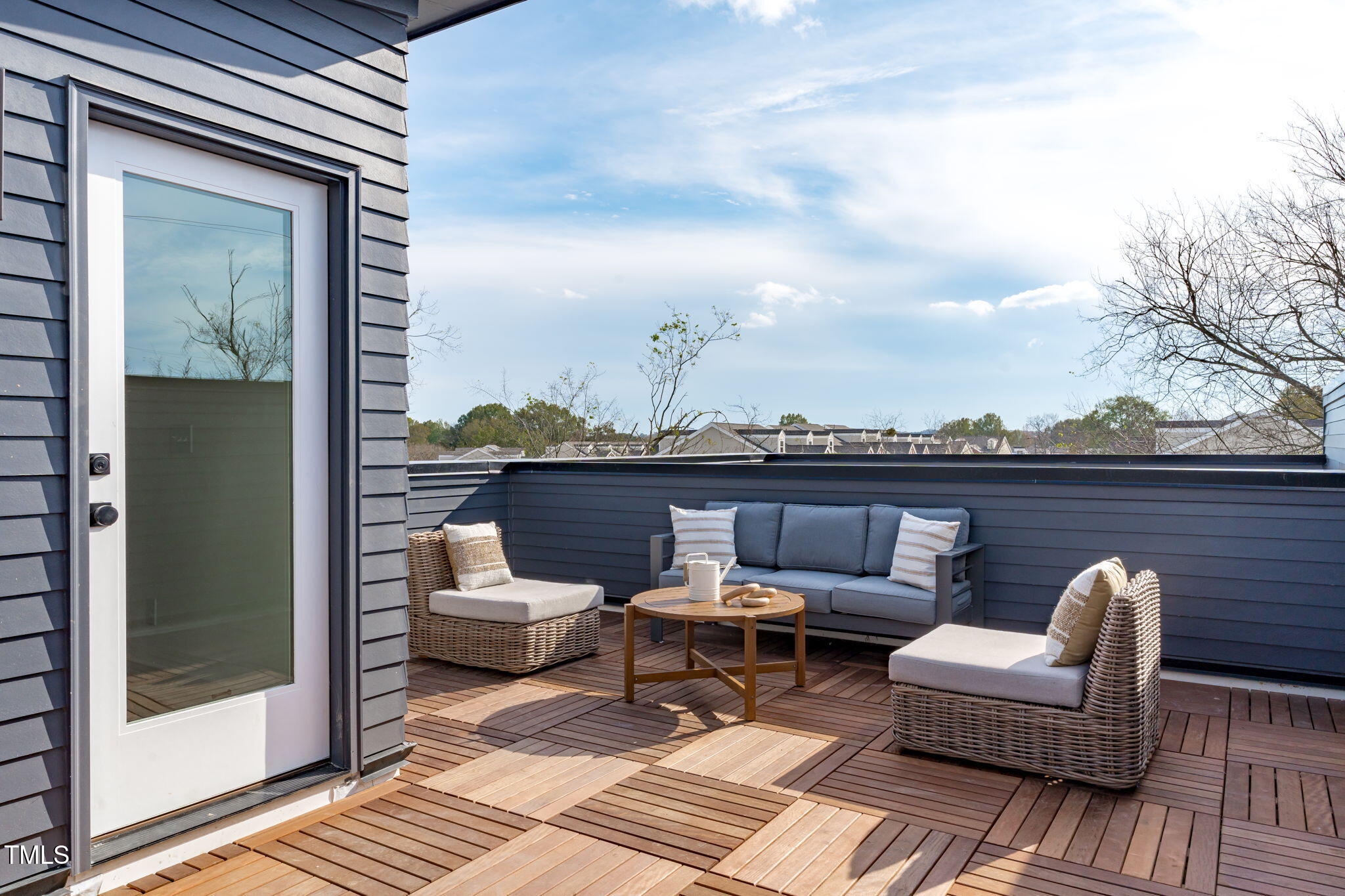 614 Rocky Knob Court Raleigh, NC 27601 - Photo 24 of 48 a view of a balcony with furniture