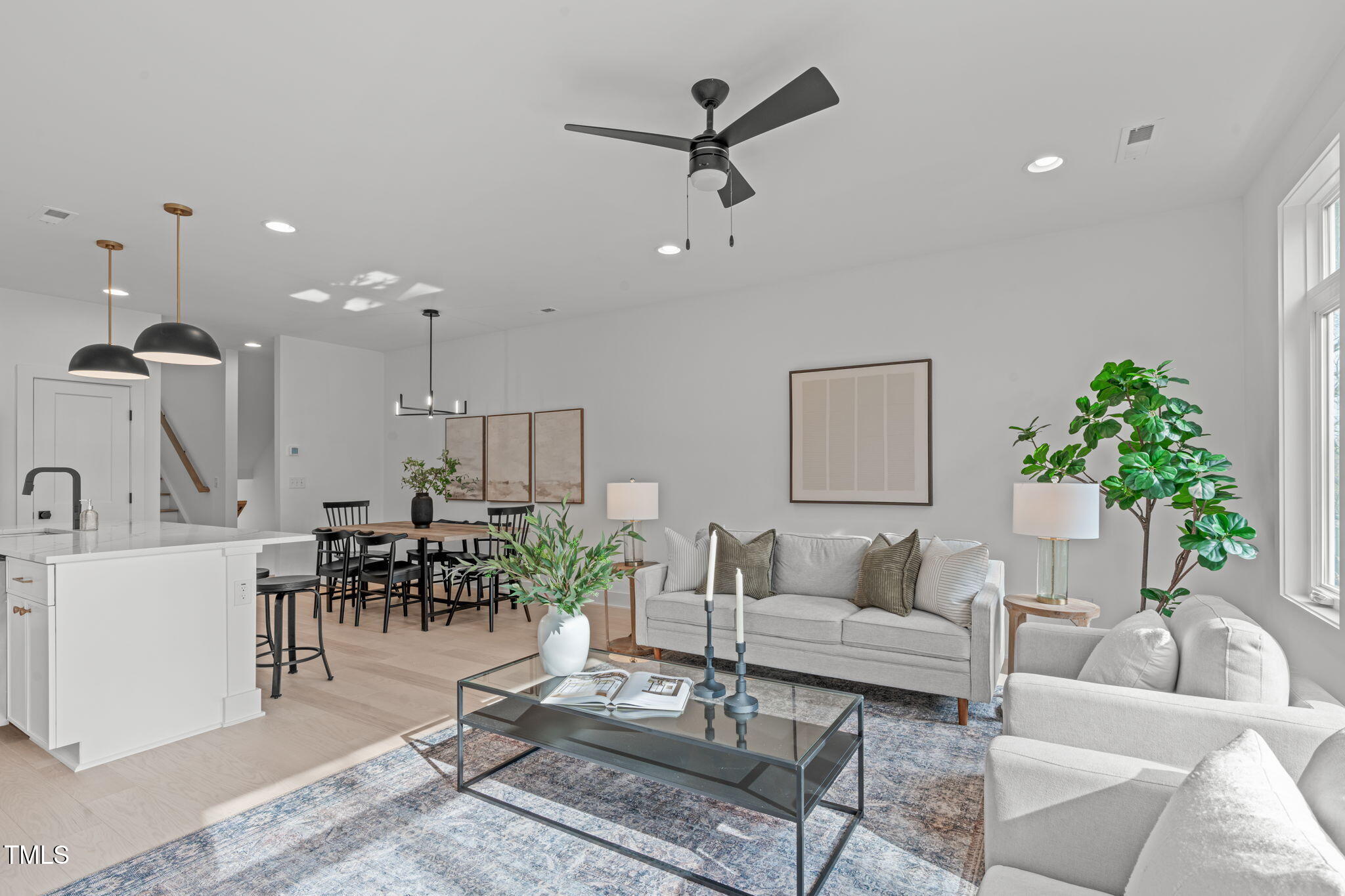614 Rocky Knob Court Raleigh, NC 27601 - Photo 6 of 48 a living room with furniture and a table