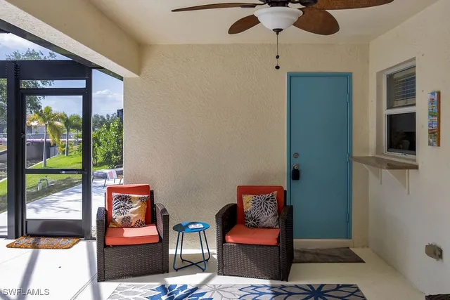 a view of building with a potted plant