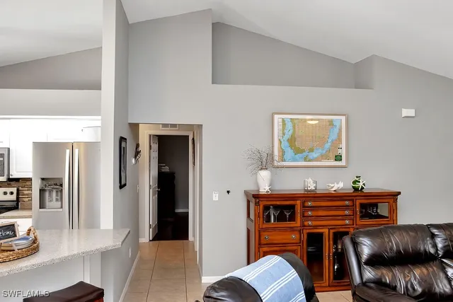 a room with furniture and wooden floor