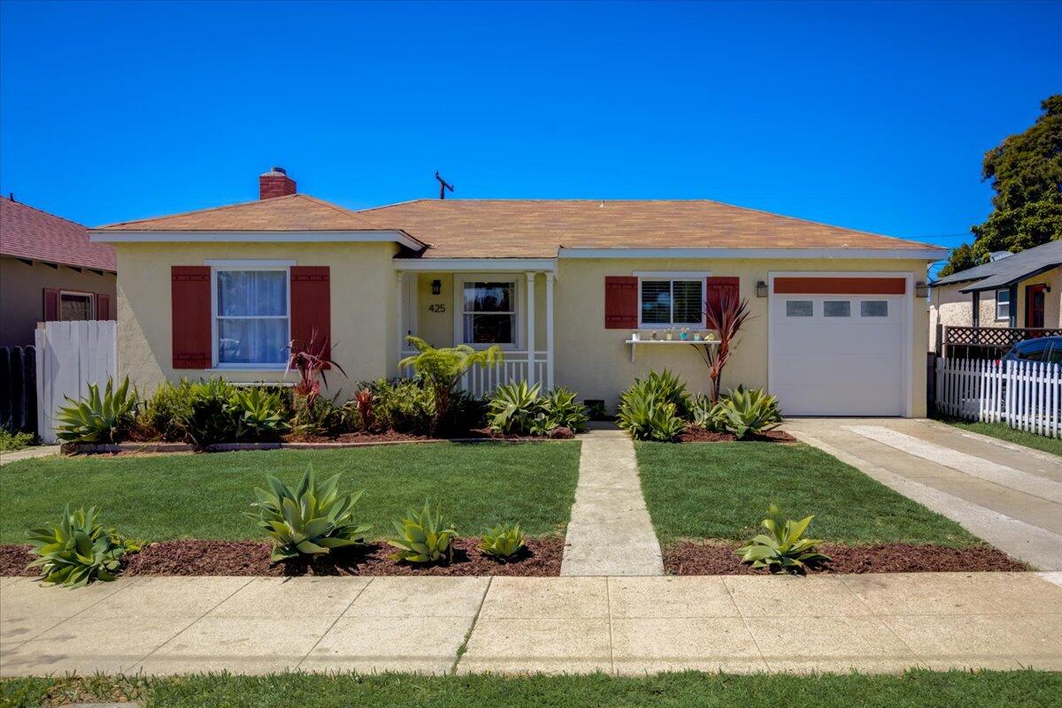 425 Howard Street Ventura, CA 93003 - Photo 1 of 31 a front view of a house with a yard