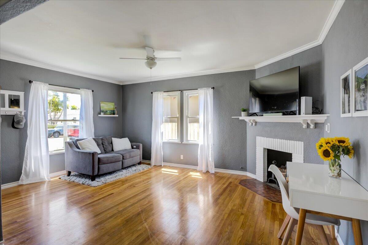 425 Howard Street Ventura, CA 93003 - Photo 11 of 31 a bedroom with a bed and a fireplace