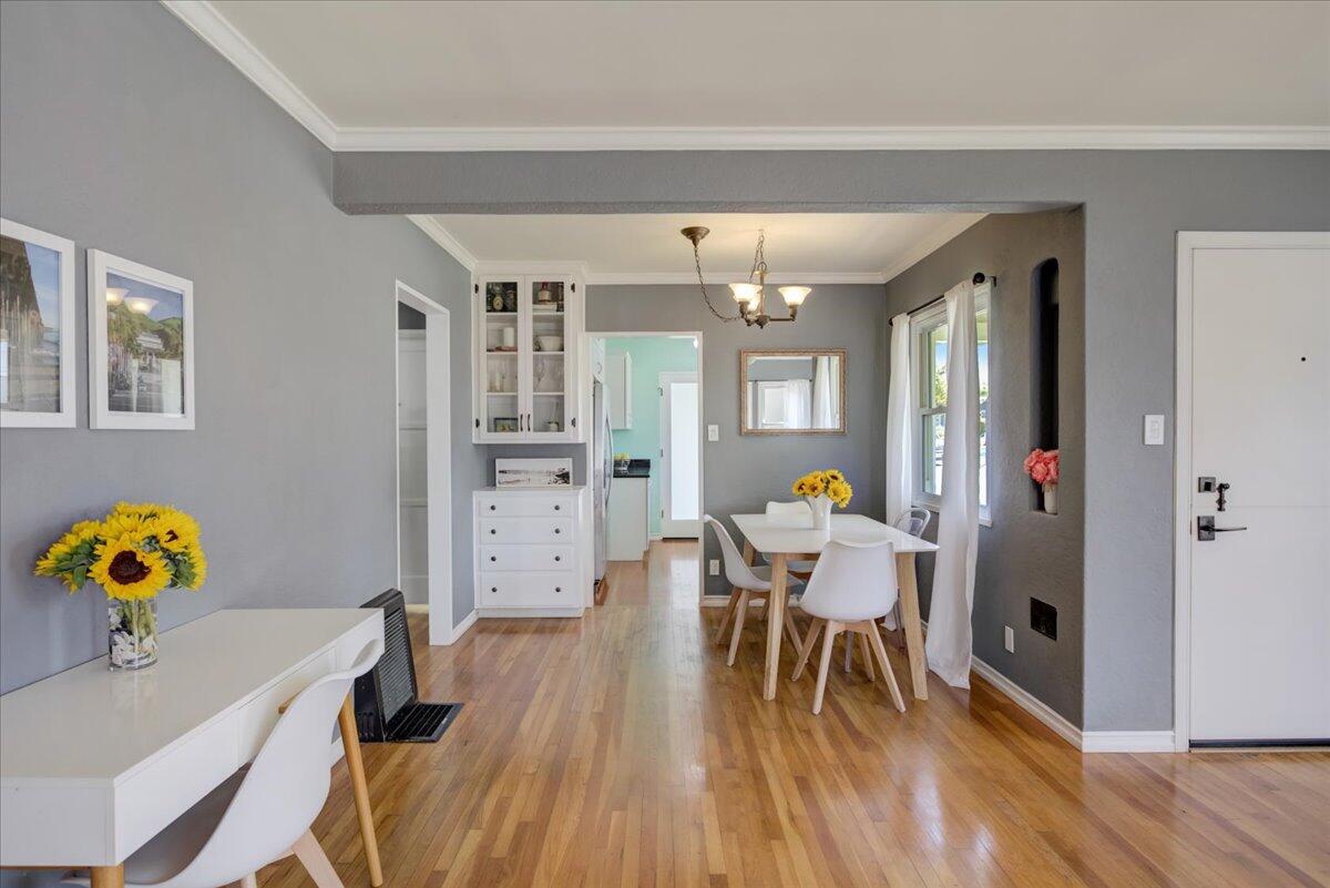 425 Howard Street Ventura, CA 93003 - Photo 12 of 31 a workspace with furniture and wooden floor