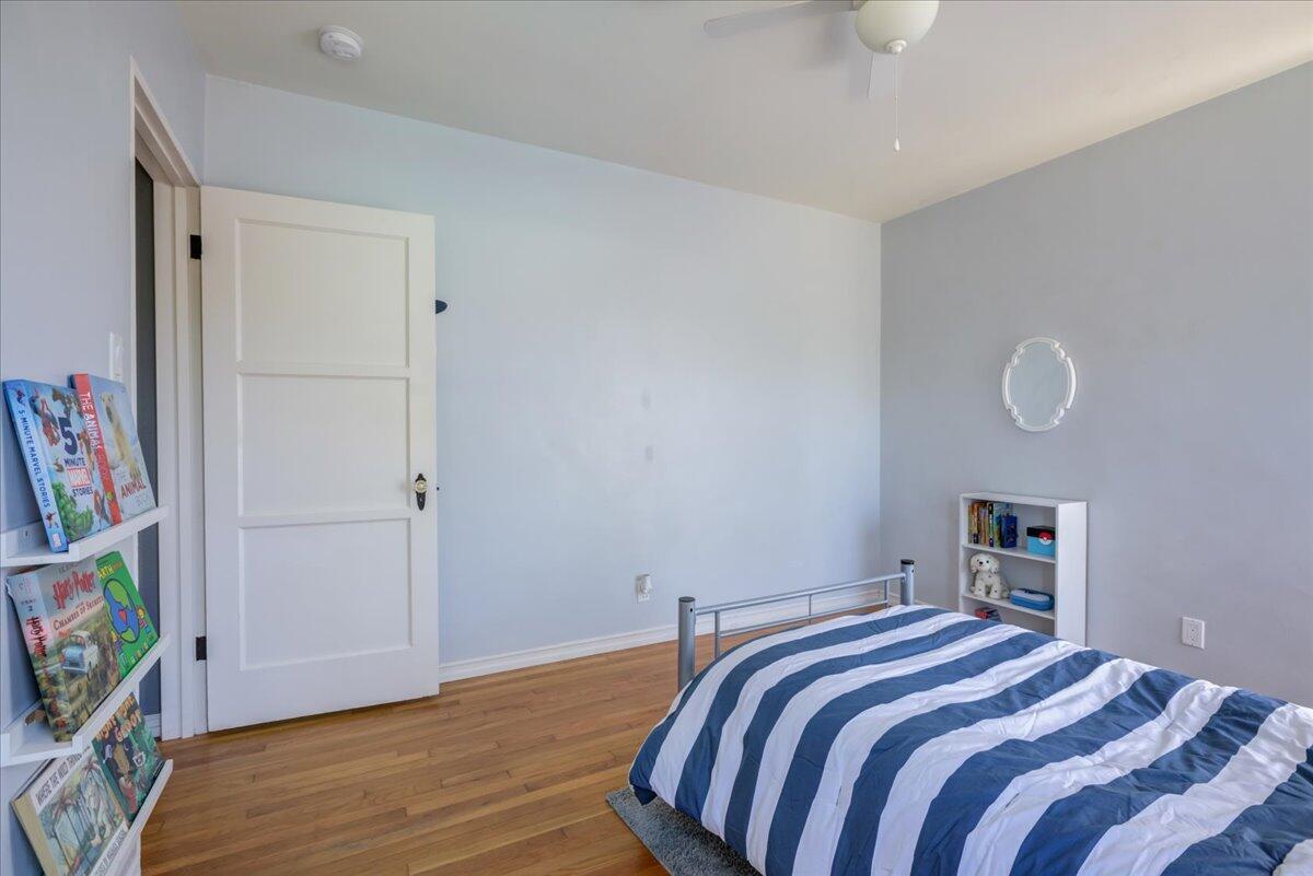 425 Howard Street Ventura, CA 93003 - Photo 20 of 31 a bedroom with a bed and a flat screen tv