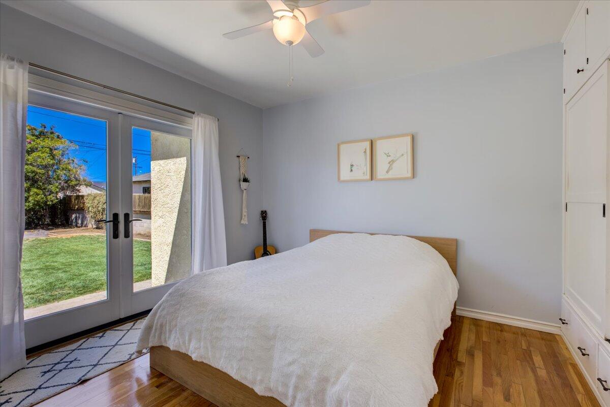 425 Howard Street Ventura, CA 93003 - Photo 22 of 31 a bedroom with a bed and a large window