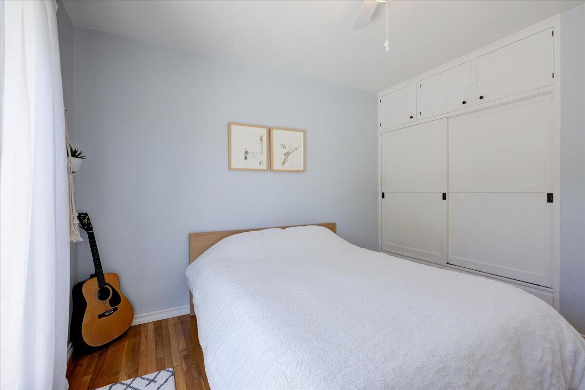 425 Howard Street Ventura, CA 93003 - Photo 24 of 31 a bedroom with a bed and cabinets