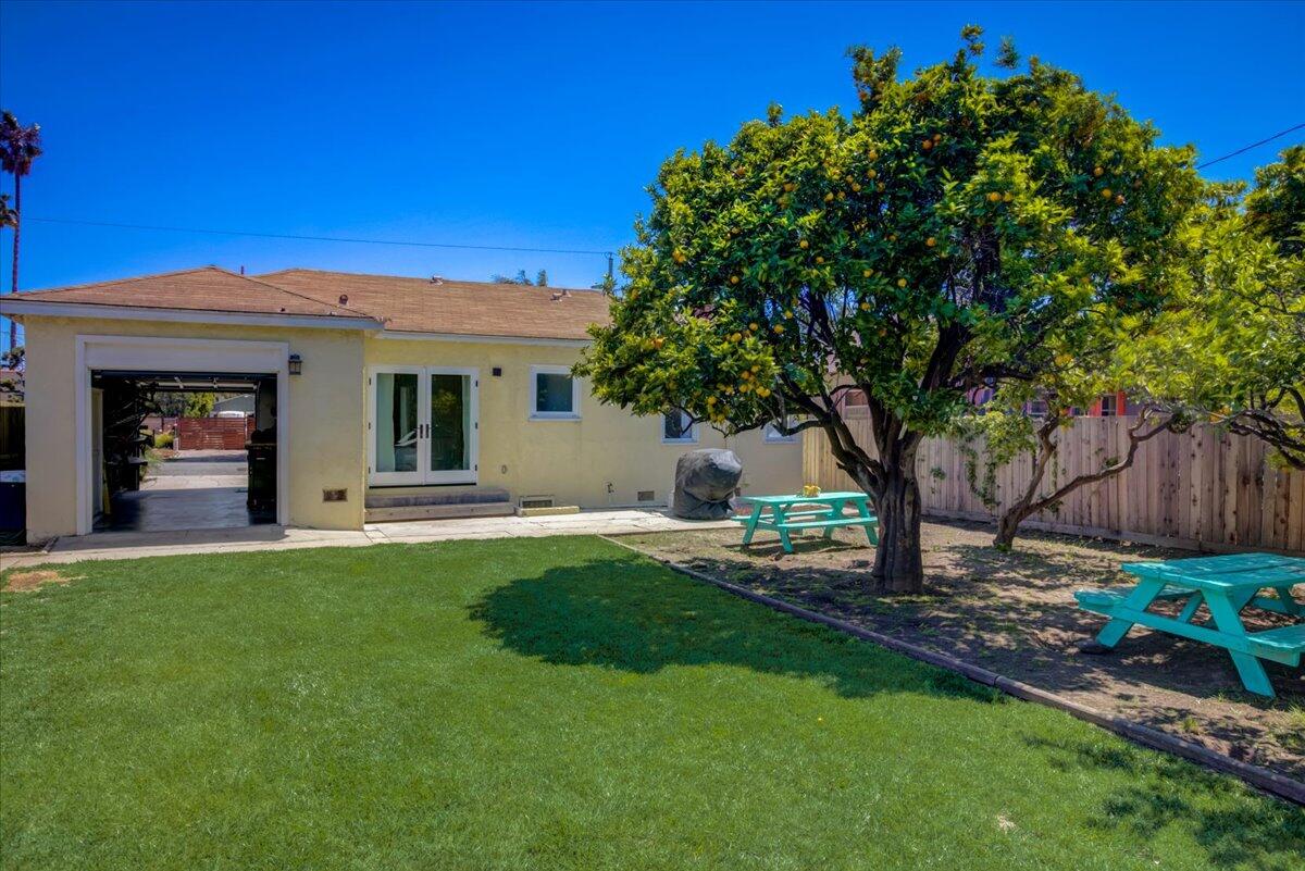 425 Howard Street Ventura, CA 93003 - Photo 27 of 31 a front view of a house with a garden