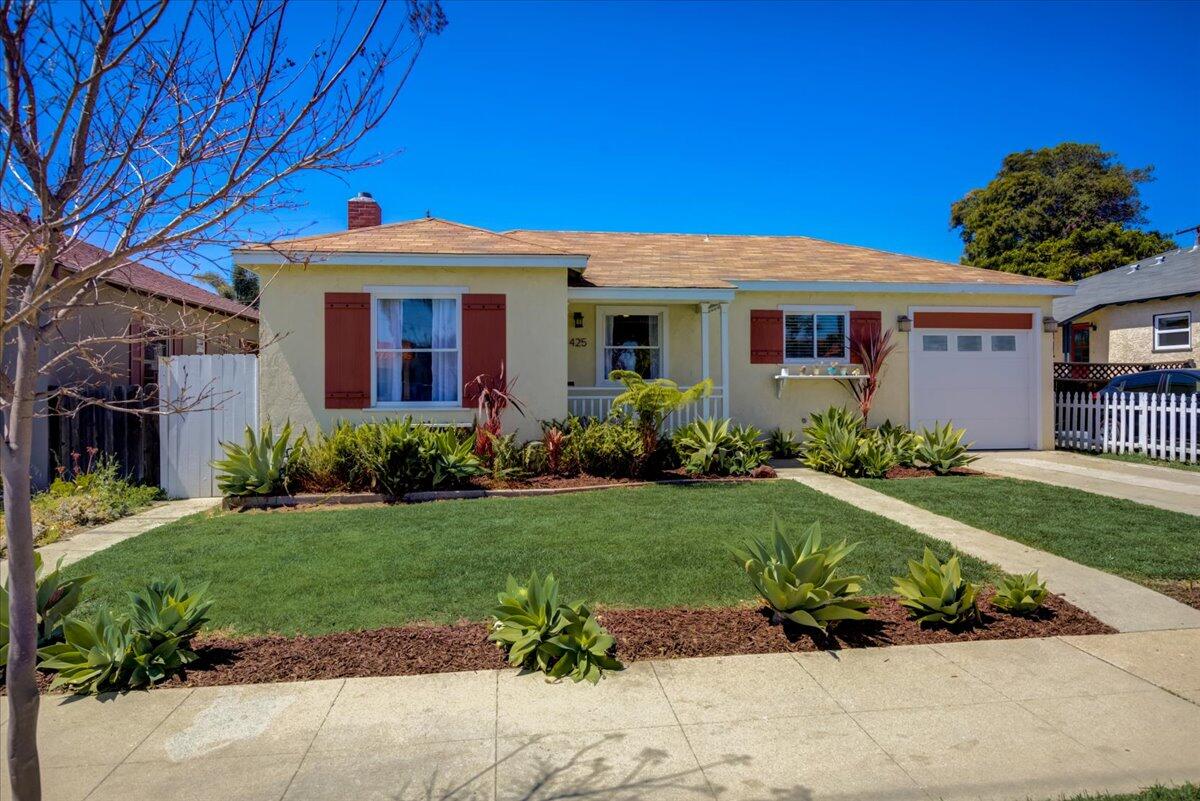 425 Howard Street Ventura, CA 93003 - Photo 6 of 31 a front view of a house with a yard