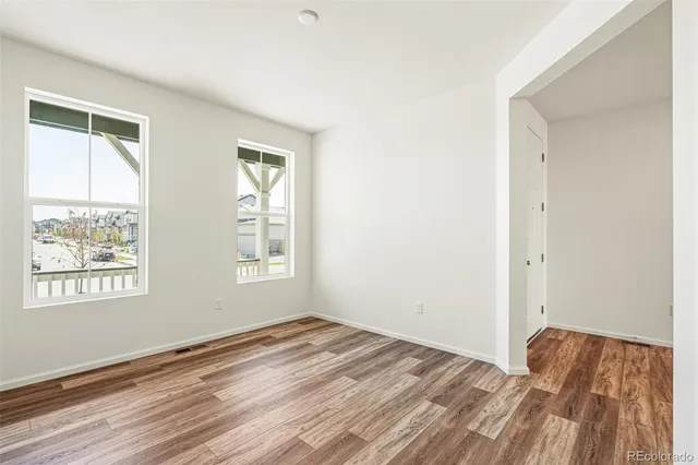 a view of an empty room and window