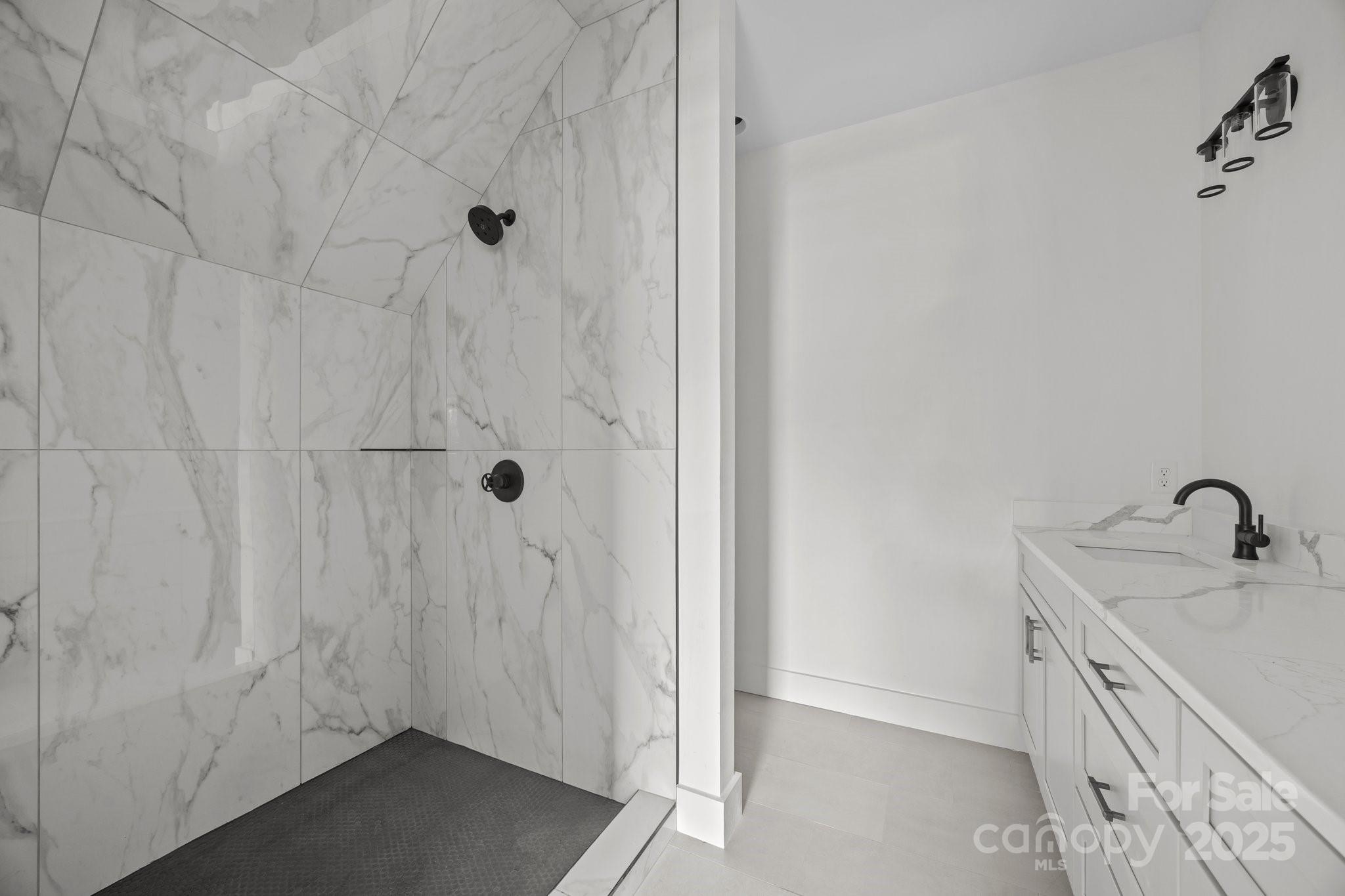 58 Pinedale Road Asheville, NC 28805 - Photo 17 of 24 a bathroom with a granite countertop sink