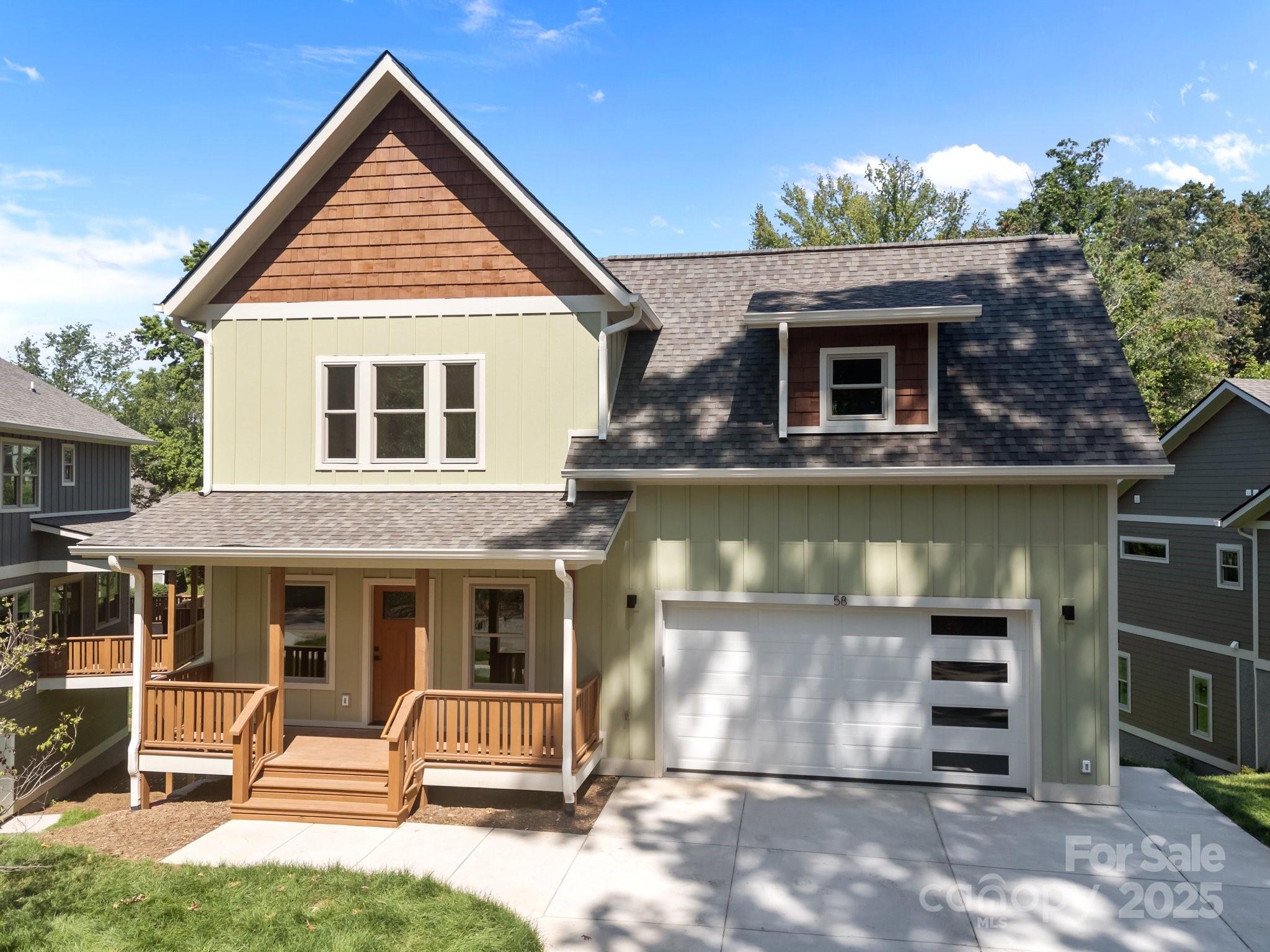 58 Pinedale Road Asheville, NC 28805 - Photo 2 of 24 a front view of a house with garden